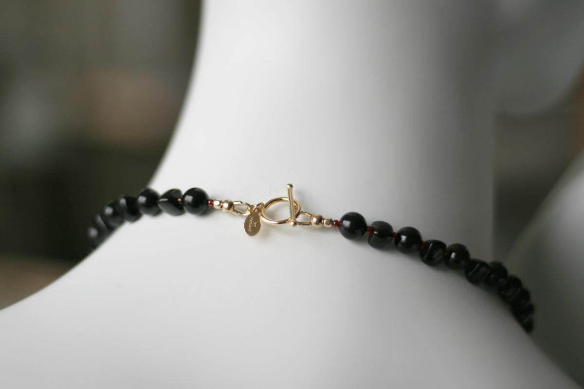 Cosmic Glow Necklace in 23-Karat Gold Leaf on Tektite Stone, Onyx, Red Seed Beads, 14-Karat Gold-Filled Toggle Clasp picture