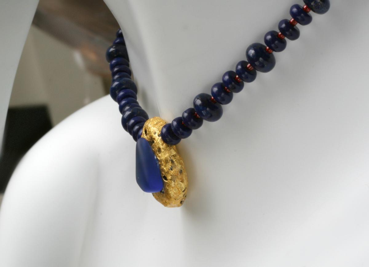 "Lapis Magic" Choker Length Necklace - Lapis Lazuli Saucer Beads, Red Seed Beads, 23-Karat Gold on Lava Nugget, Tumbled Blue Glass, Toggle Clasp picture