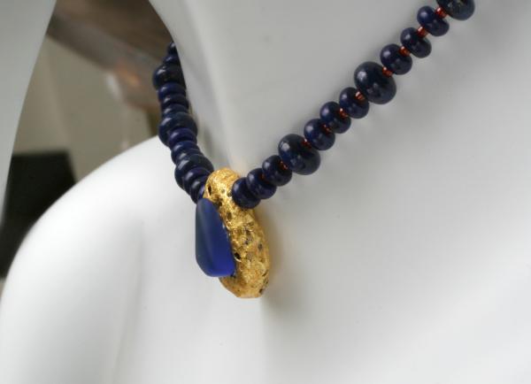 "Lapis Magic" Choker Length Necklace - Lapis Lazuli Saucer Beads, Red Seed Beads, 23-Karat Gold on Lava Nugget, Tumbled Blue Glass, Toggle Clasp picture