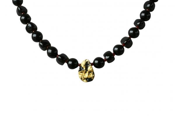 Cosmic Glow Necklace in 23-Karat Gold Leaf on Tektite Stone, Onyx, Red Seed Beads, 14-Karat Gold-Filled Toggle Clasp