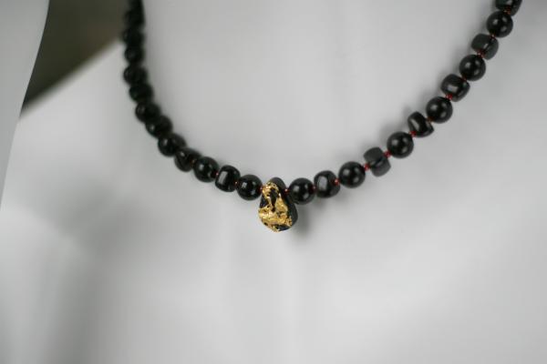 Cosmic Glow Necklace in 23-Karat Gold Leaf on Tektite Stone, Onyx, Red Seed Beads, 14-Karat Gold-Filled Toggle Clasp picture