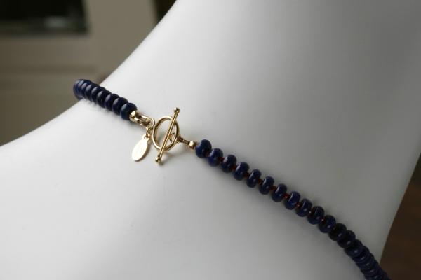 "Lapis Magic" Choker Length Necklace - Lapis Lazuli Saucer Beads, Red Seed Beads, 23-Karat Gold on Lava Nugget, Tumbled Blue Glass, Toggle Clasp picture