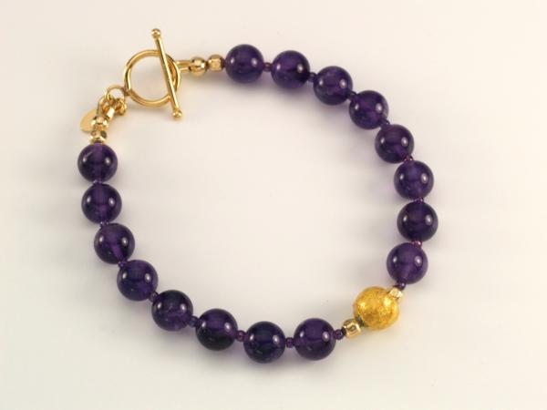 "Purple Passion" Bracelet - Amethyst, 23-Karat Gold Leaf on Lava, Seed Beads, 14-Karat Gold-Filled Toggle Clasp, and Artist Signature Tag picture