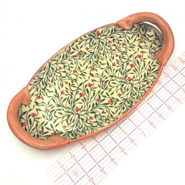 Handmade ceramic serving platter with handles in calico floral print and bright poppy glaze picture