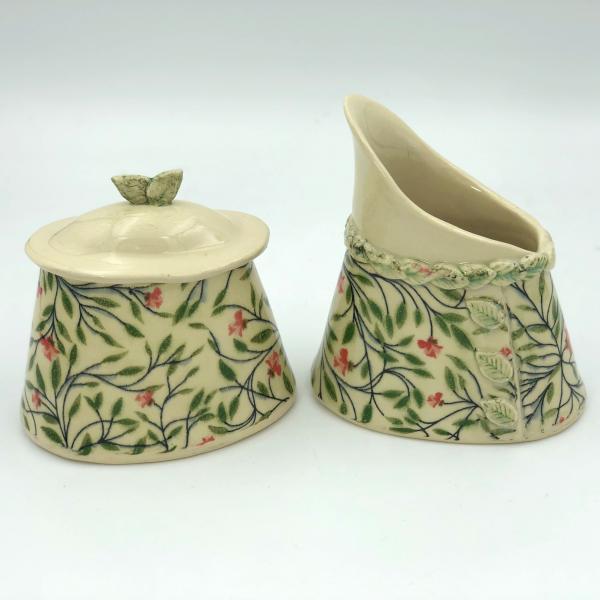 Ceramic sugar bowl and cream pitcher in adorable floral pattern picture