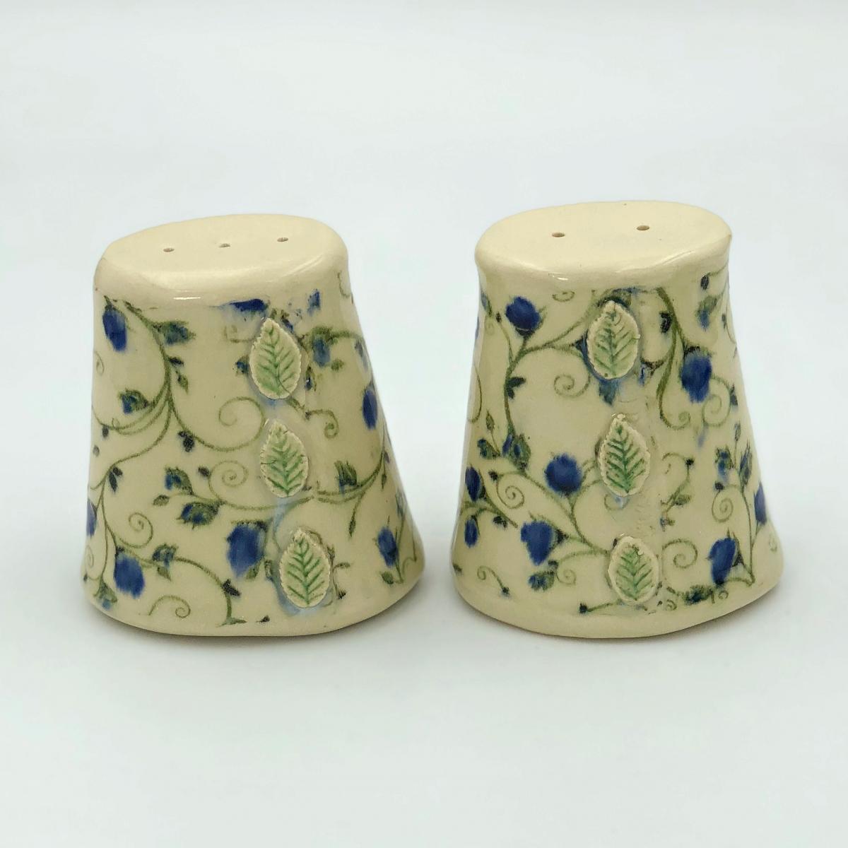 Handmade ceramic salt and pepper set in cute calico floral pattern in pink or blue picture