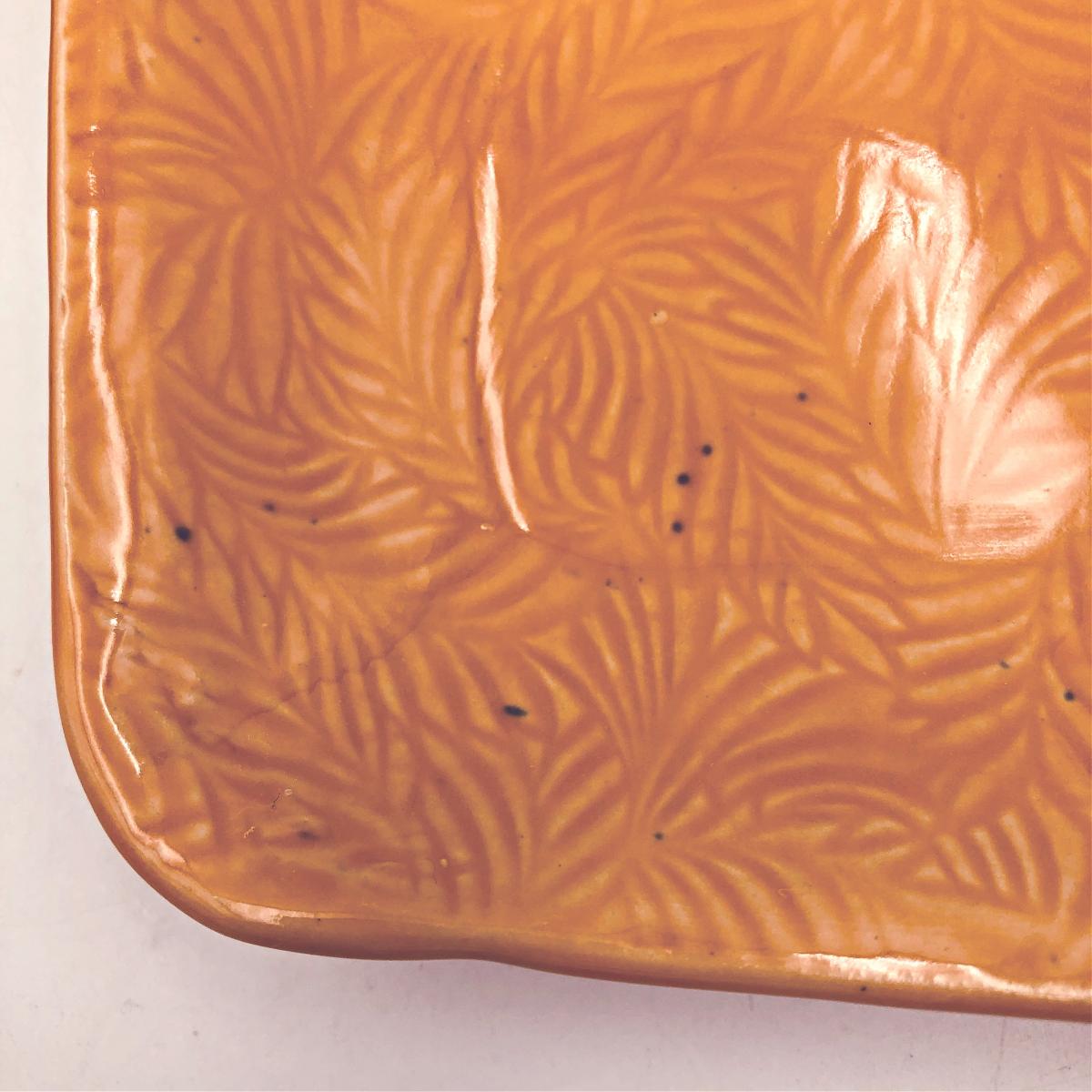 Pair of handmade square-ish ceramic plates with hibiscus flowers and texture picture