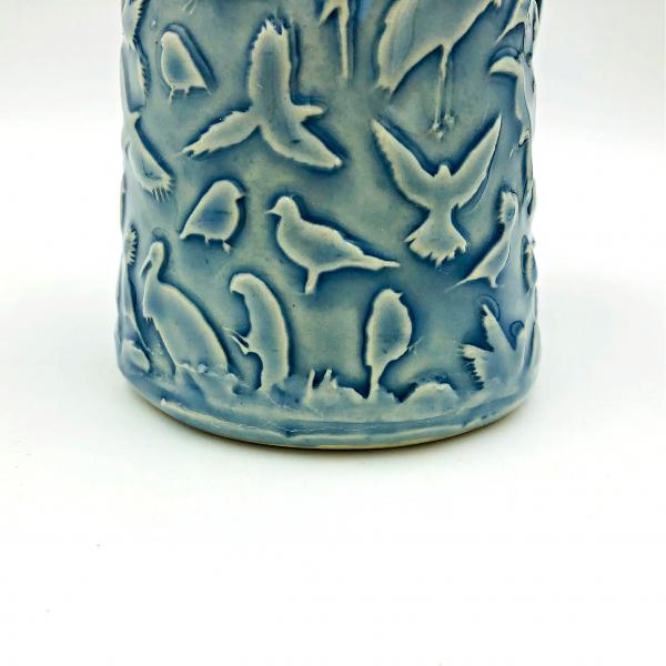 Ceramic coffee cup  textured  overall with Birds picture