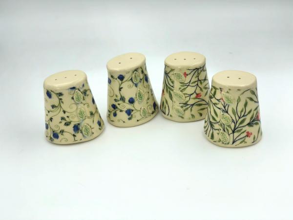 Handmade ceramic salt and pepper set in cute calico floral pattern in pink or blue