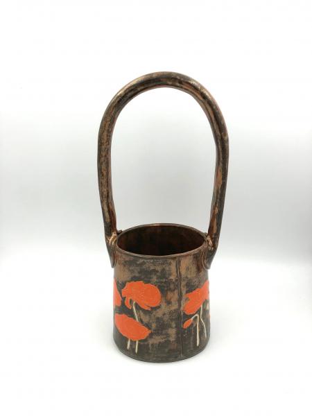 Large ceramic basket vase with bright orange poppies and shiny copper glaze picture