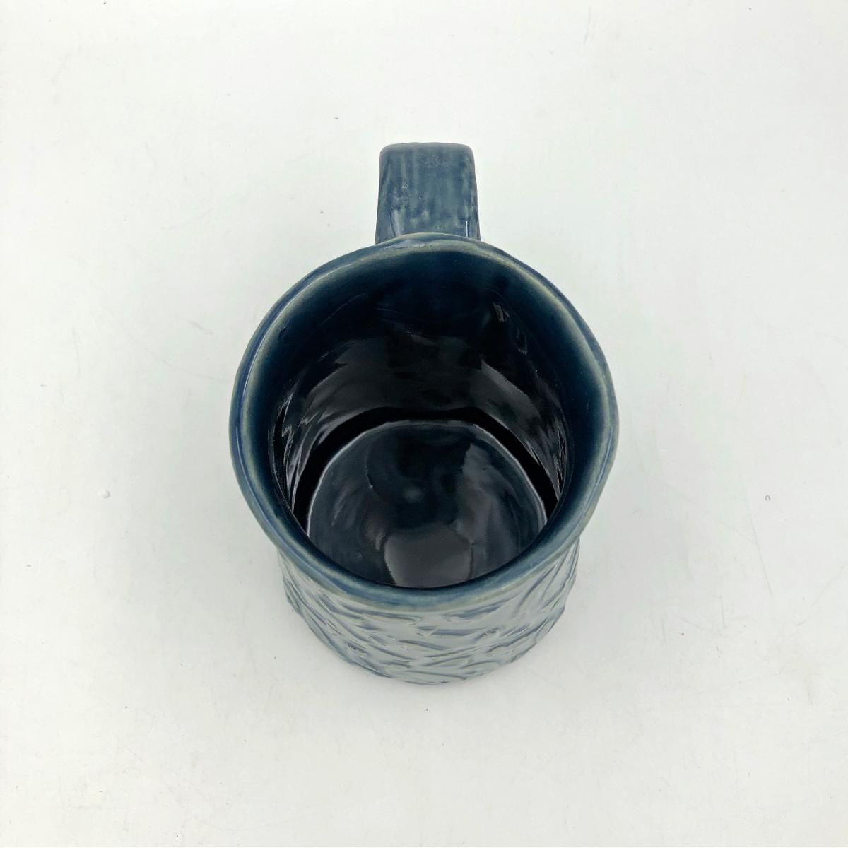 Ceramic coffee cup  textured  overall with Birds picture