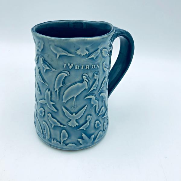 Ceramic coffee cup  textured  overall with Birds picture
