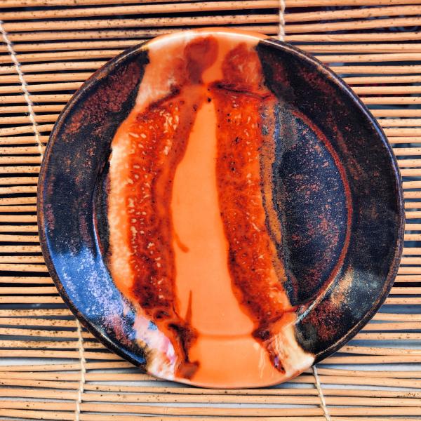 Ceramic spoon rest with gorgeous copper edges and colorful strip in the center. picture