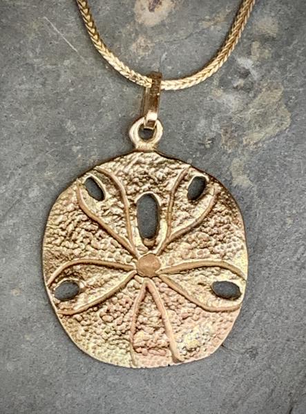 Sand dollar Pendant 14kt yellow gold picture