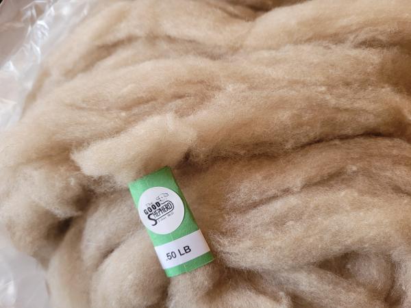wool processed into roving or batts picture