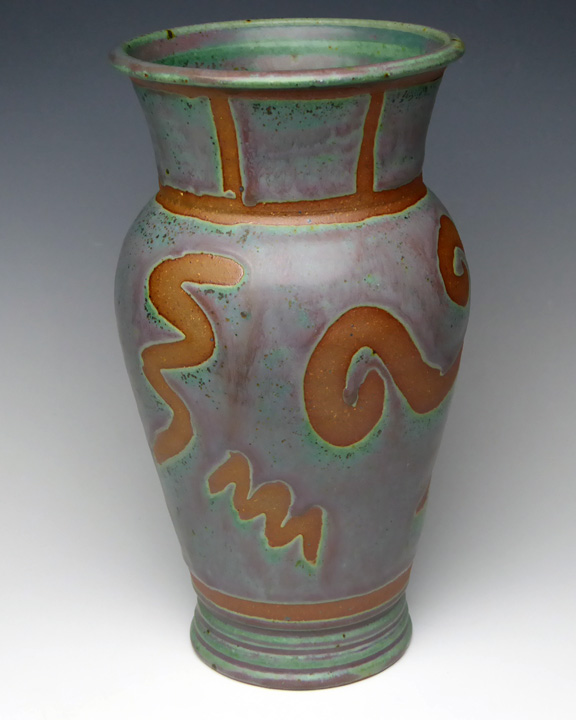 Turquoise mini vase with tan accents picture