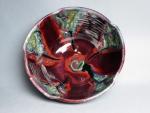 Altered shape serving bowl, red multi color galze