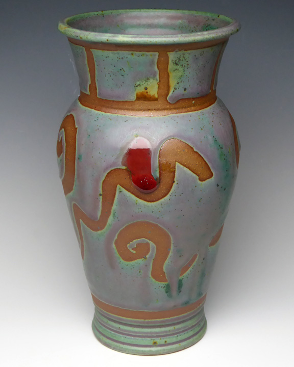 Turquoise mini vase with tan accents picture