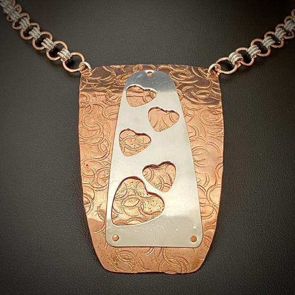 Copper Shield with Silver Hearts Necklace picture