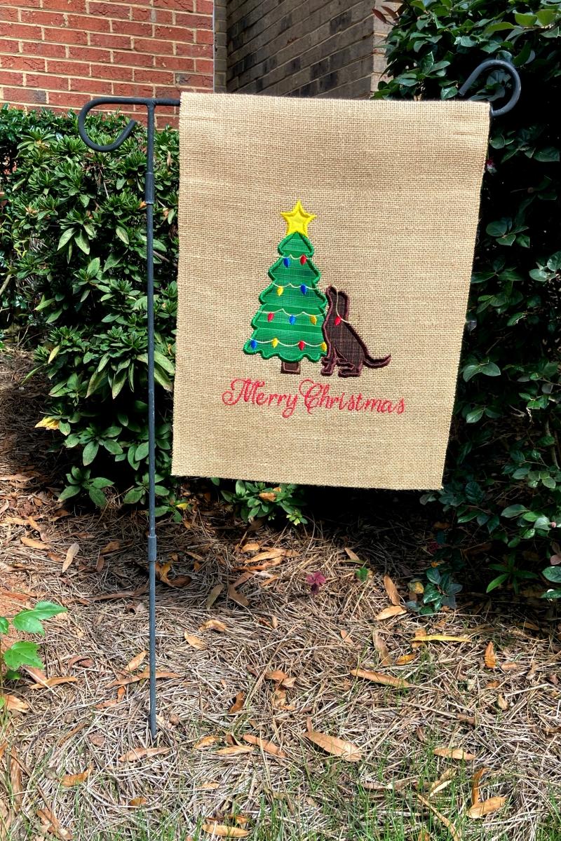Dog with Christmas Tree Yard Flag picture