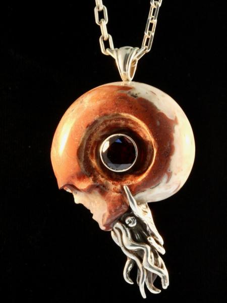 Carved Skull and Nautilus Pendant with Garnet - Silver picture