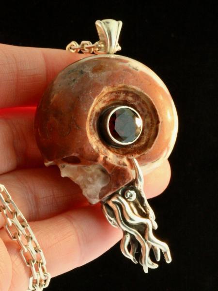 Carved Skull and Nautilus Pendant with Garnet - Silver picture