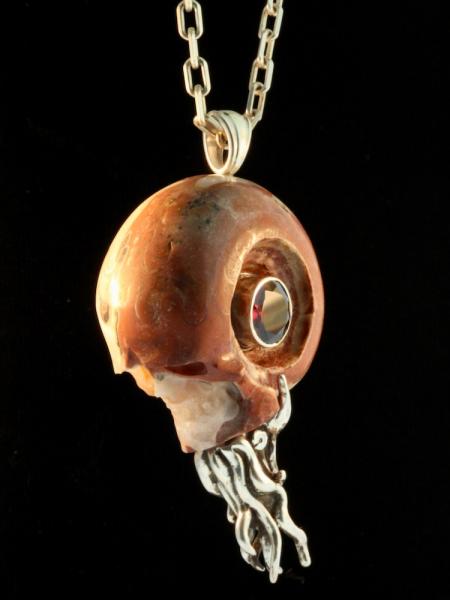 Carved Skull and Nautilus Pendant with Garnet - Silver picture
