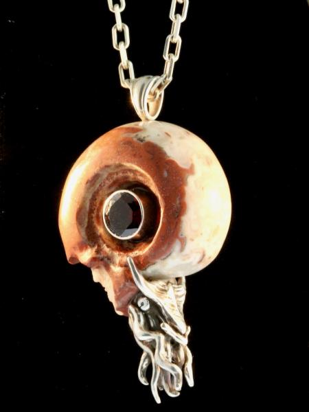 Carved Skull and Nautilus Pendant with Garnet - Silver picture