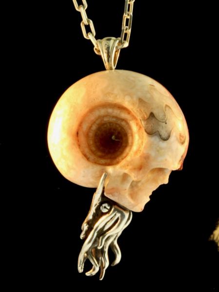 Carved Skull and Nautilus Pendant with Garnet - Silver picture