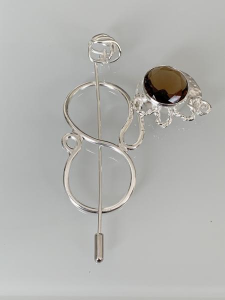 Scarf pin, silver plate with smokey faceted glass.