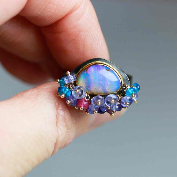 Queensland Pipe Opal with Undersea Ridges and Tanzanite Fringe. Ring Size 8 1/2. picture