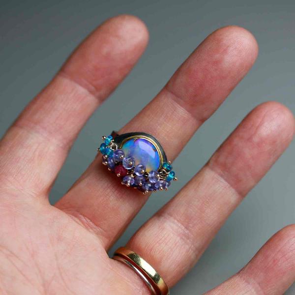 Queensland Pipe Opal with Undersea Ridges and Tanzanite Fringe. Ring Size 8 1/2. picture