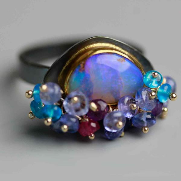 Queensland Pipe Opal with Undersea Ridges and Tanzanite Fringe. Ring Size 8 1/2. picture