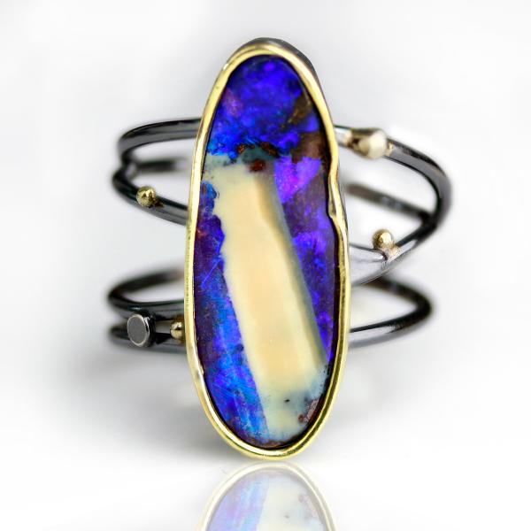 Vivid Violet Boulder Opal Ring with Swirled Band. Size 8 1/4.