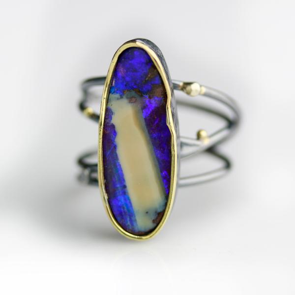 Vivid Violet Boulder Opal Ring with Swirled Band. Size 8 1/4. picture