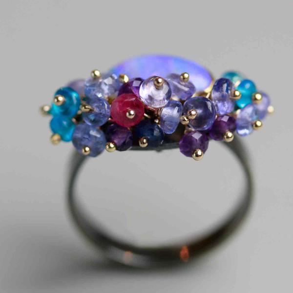 Queensland Pipe Opal with Undersea Ridges and Tanzanite Fringe. Ring Size 8 1/2. picture