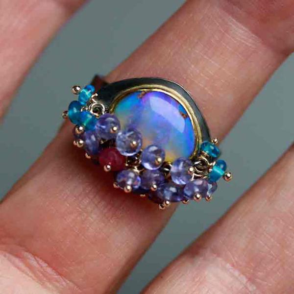 Queensland Pipe Opal with Undersea Ridges and Tanzanite Fringe. Ring Size 8 1/2. picture