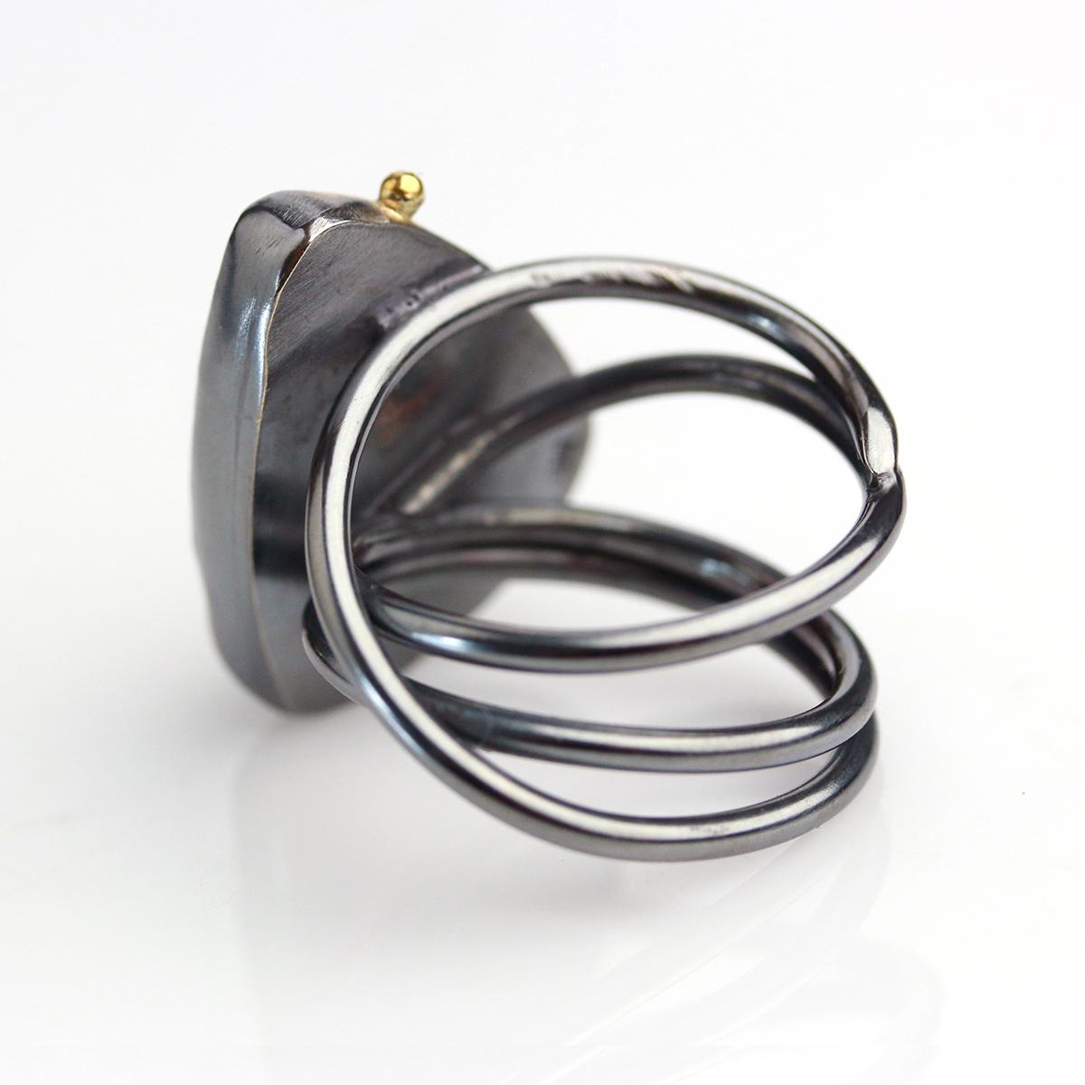 Fossil Coral with Gold Dot on a Swirled Band. Size 7. picture