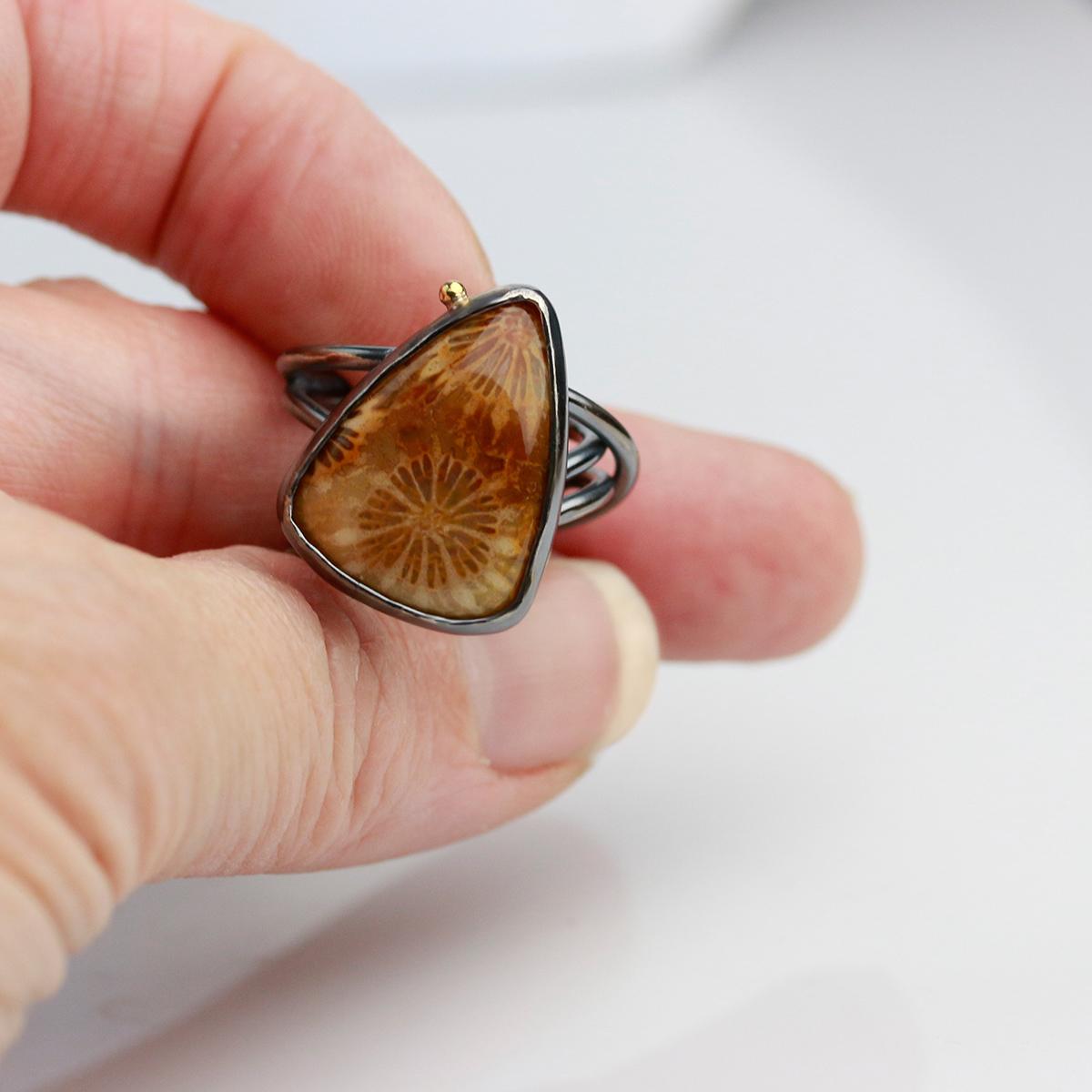 Fossil Coral with Gold Dot on a Swirled Band. Size 7. picture