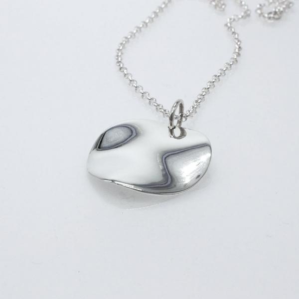 Lucilla Disc Sterling Silver Pendant With High Polished Sterling Silver Wave | Adjustable Silver Chain picture