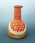 Vase with orange flowers