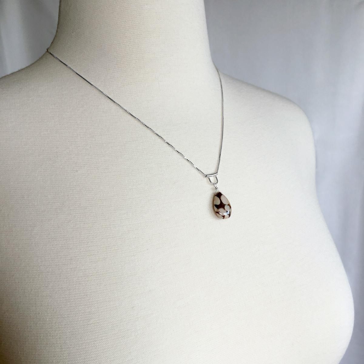 U-Tube Peanut Wood Necklace Petrified Wood Polka Dot picture