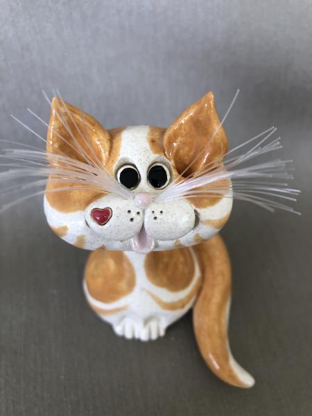 Orange Tabby cat figurine picture