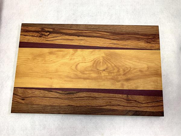 Walnut, Chechen, Purpleheart, Yellowheart Cuttingboard picture