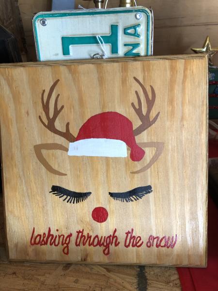 Wood sign with female deer picture