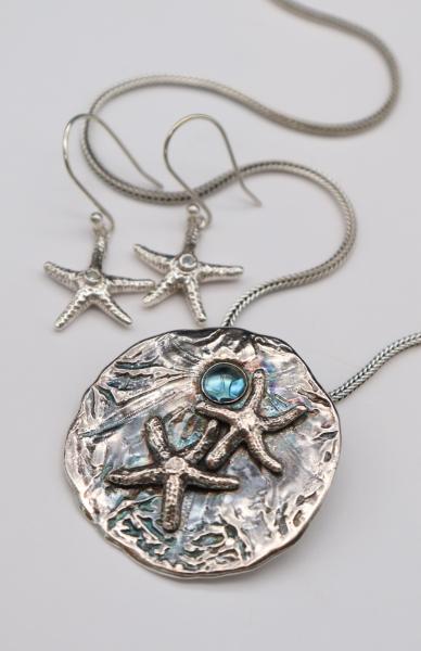 Sand Dollar with Starfish and Blue Topaz picture
