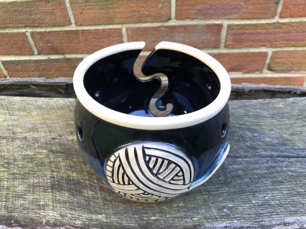 Black & Blue Yarn Bowl With a Ball of Yarn Image 1 picture