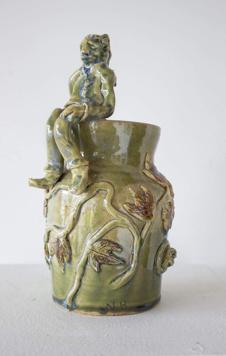 Green Vase with Seated Figure picture