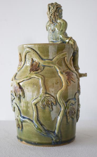 Green Vase with Seated Figure picture