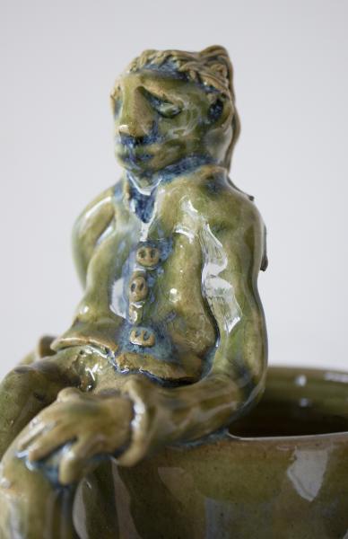 Green Vase with Seated Figure picture